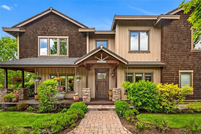 a front view of a house with garden