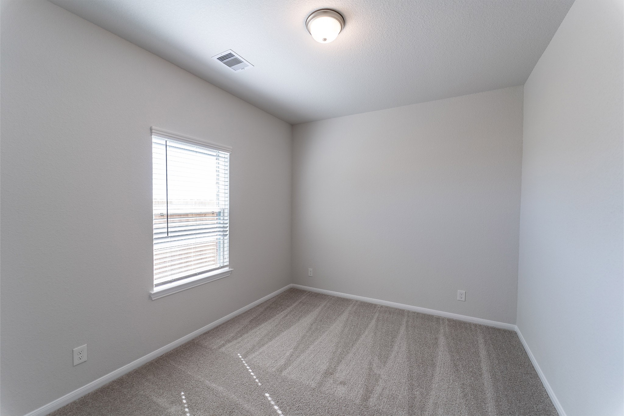 418 Hazy Meadows Drive Beasley, TX 77417 - Photo 15 of 17 an empty room with a window