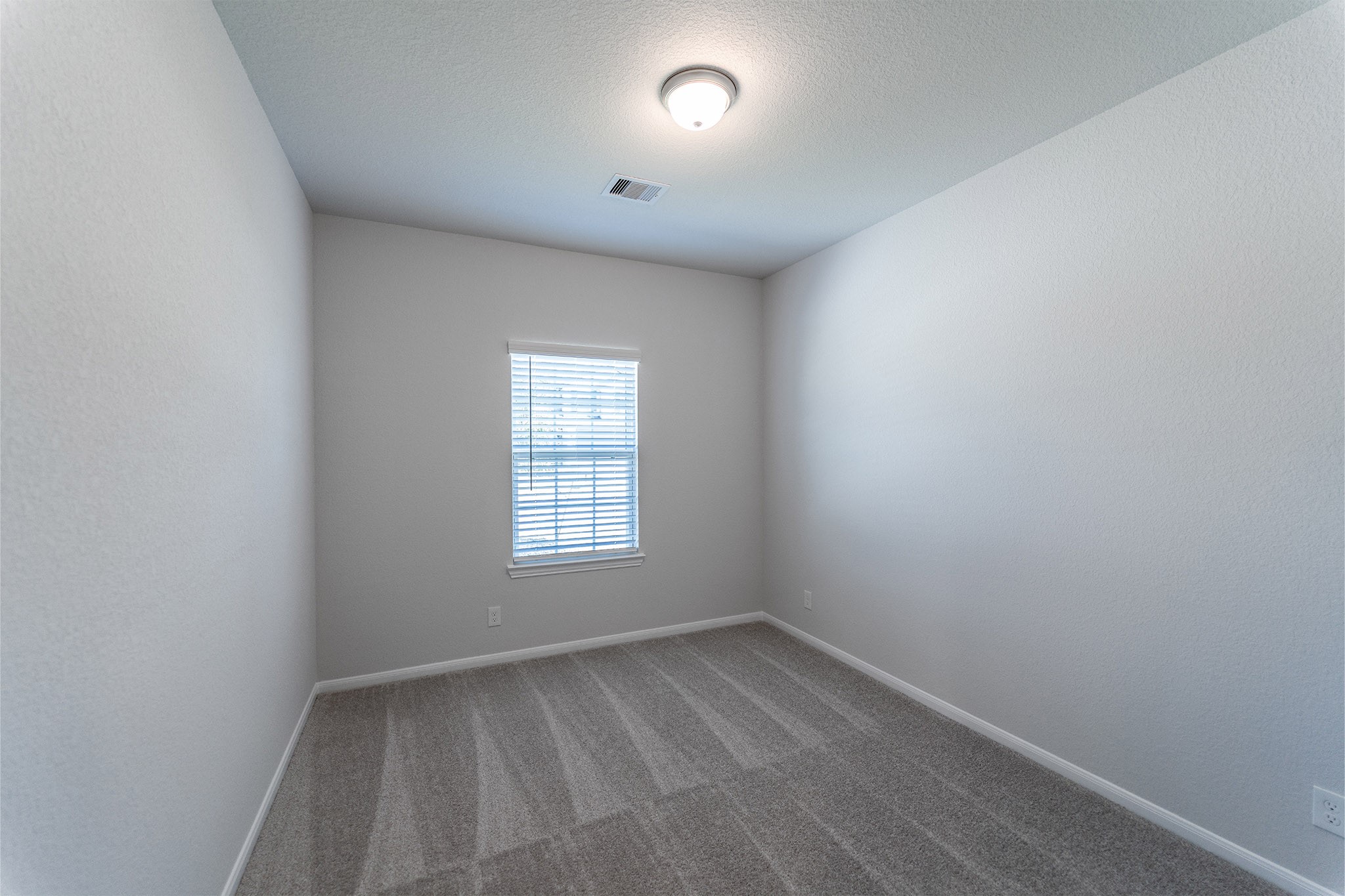 418 Hazy Meadows Drive Beasley, TX 77417 - Photo 16 of 17 an empty room with a window