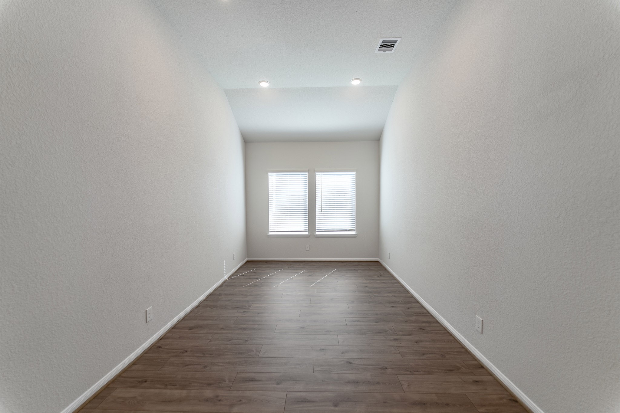 418 Hazy Meadows Drive Beasley, TX 77417 - Photo 6 of 17 a view of a room with wooden floor and window