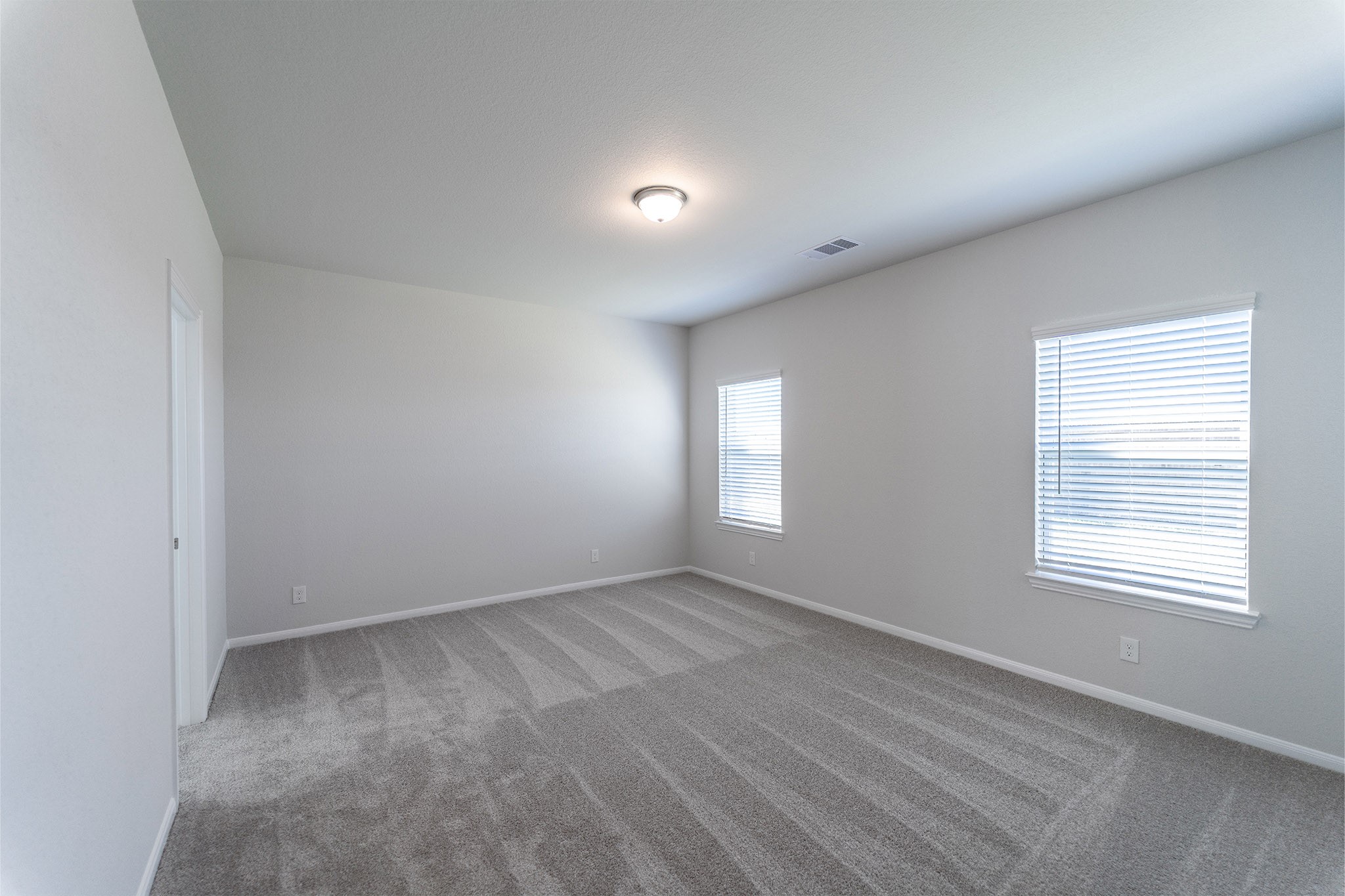 418 Hazy Meadows Drive Beasley, TX 77417 - Photo 8 of 17 an empty room with a window