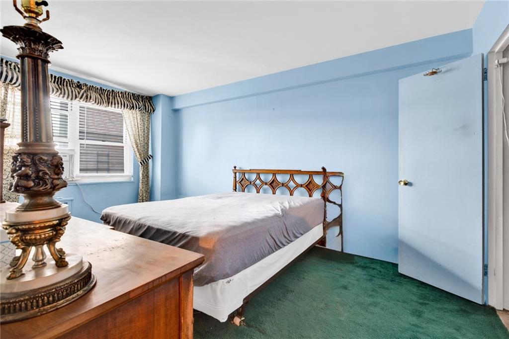 2940 West 5th Street, Unit 2B Brooklyn, NY 11224 - Photo 13 of 25 a bedroom with a bed and windows