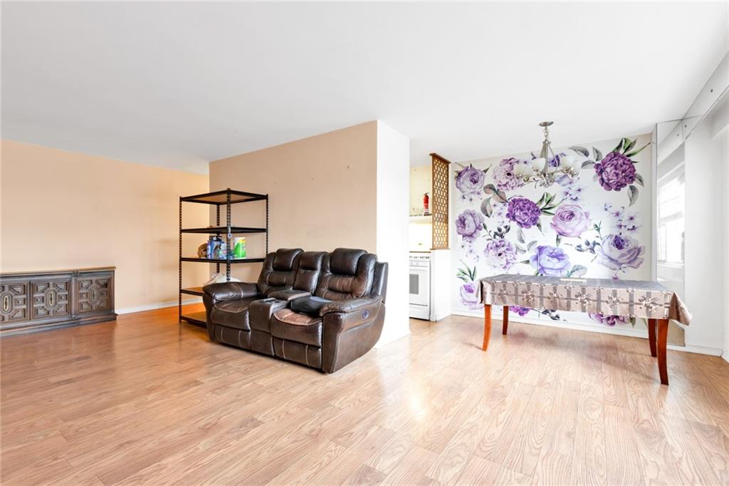 2940 West 5th Street, Unit 2B Brooklyn, NY 11224 - Photo 2 of 25 a living room with furniture and wooden floor