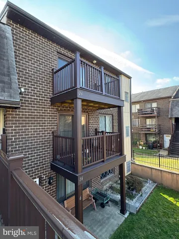 a view of porch with a bench