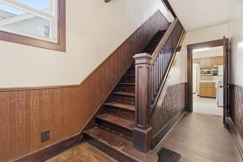 2375 East Beckert Avenue Pittsburgh, PA 15212 - Photo 18 of 28 a view of a hallway with wooden floor and staircase