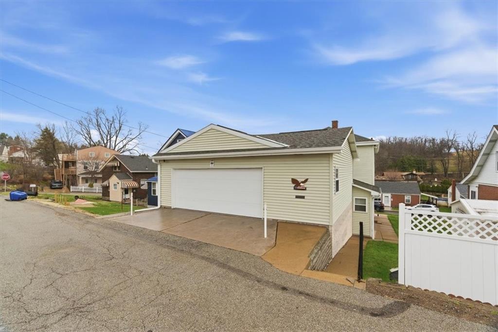 2375 East Beckert Avenue Pittsburgh, PA 15212 - Photo 28 of 28 a view of a house with a yard and garage