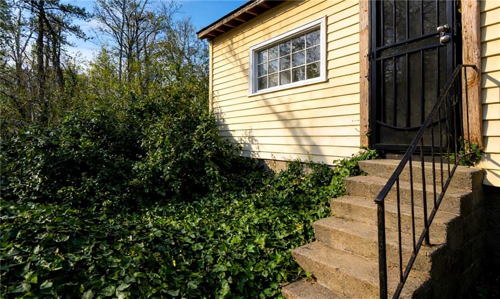 731 Bolton Road Northwest Atlanta, GA 30331 - Photo 6 of 20 a view of a house with a yard
