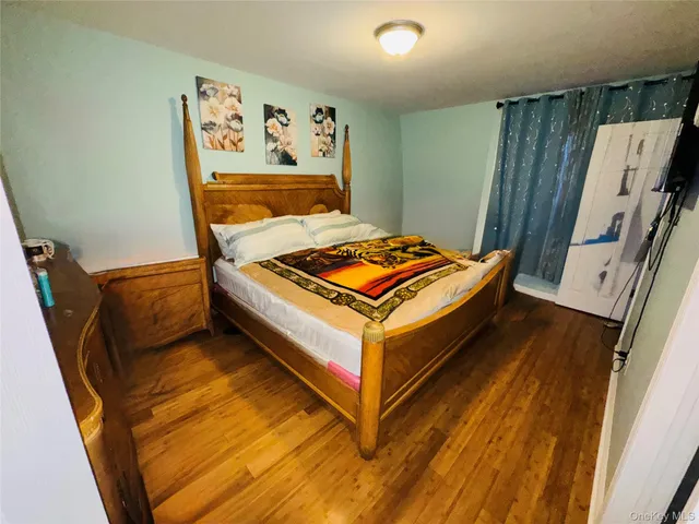 a room with furniture and wooden floor