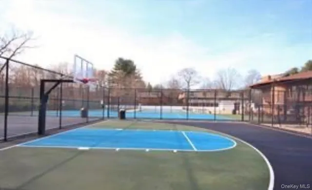 a view of a swimming pool with a yard