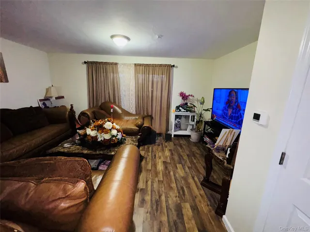 a bed room with furniture and a window