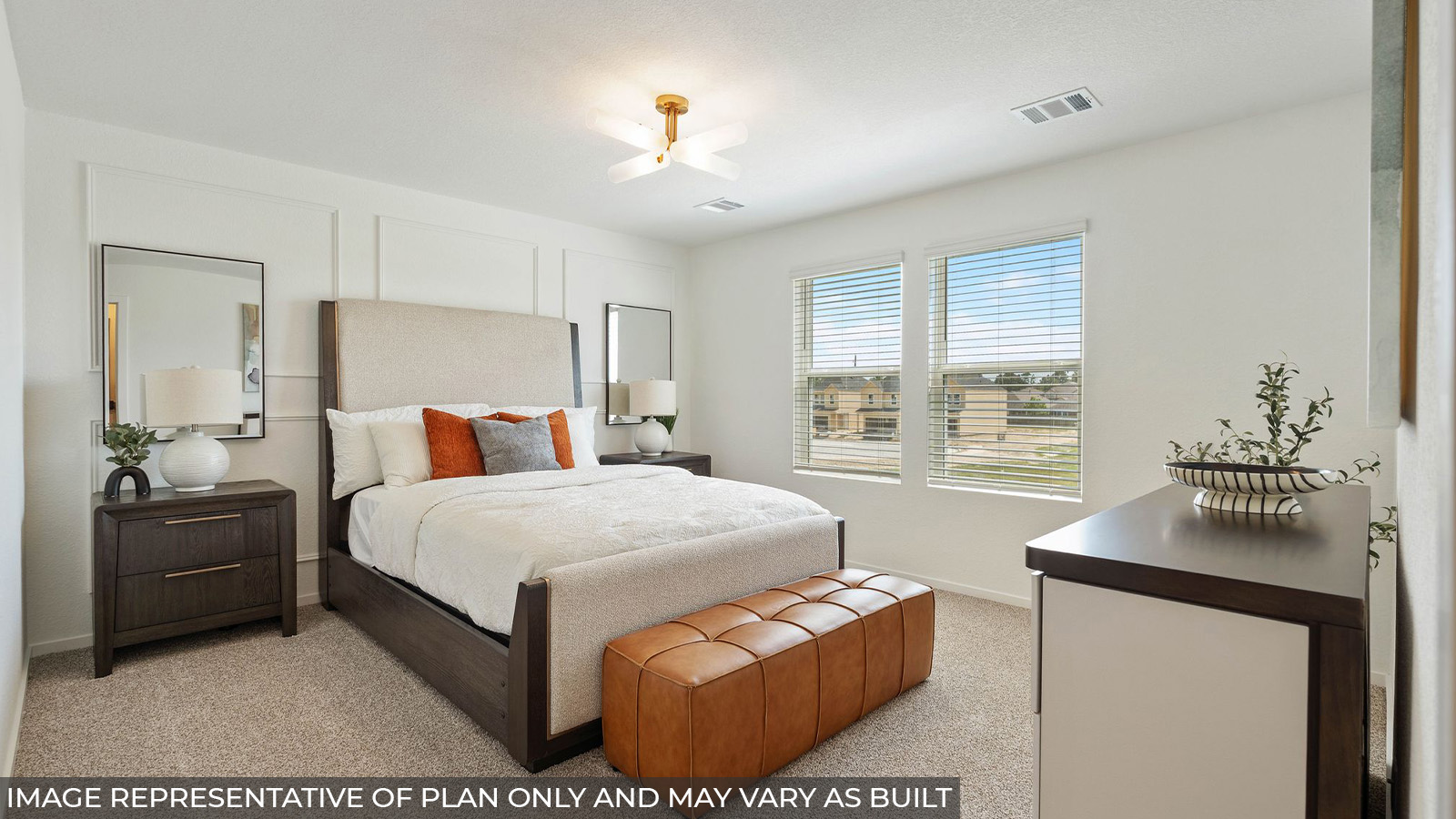 376 Old Stage Coach Road Jarrell, TX 76537 - Photo 13 of 21 A well-lit bedroom features plush carpeting and broad windows.