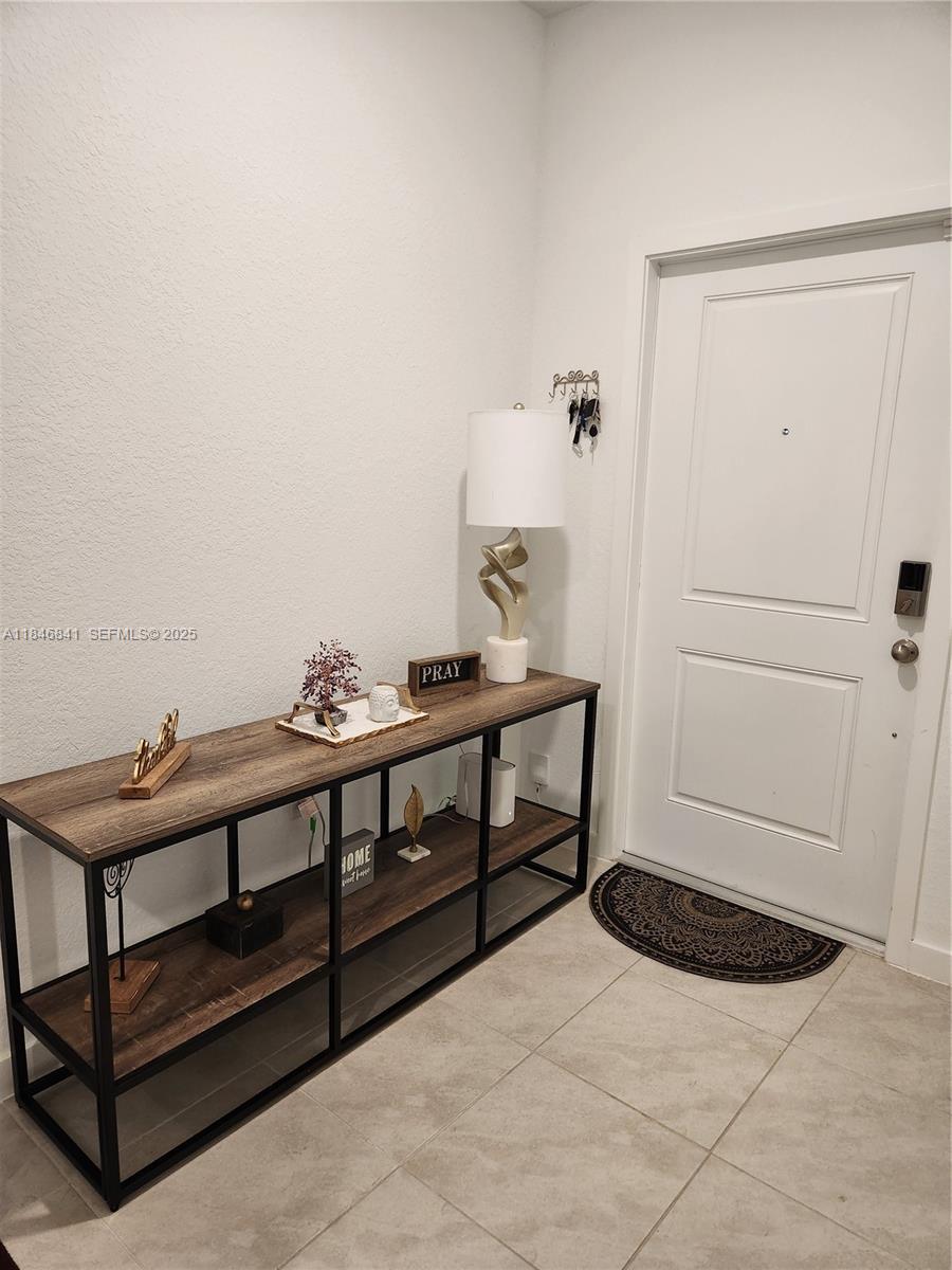 880 Northwest 3rd Way, Unit 880 Pompano Beach, FL 33060 - Photo 15 of 34 a living room with furniture