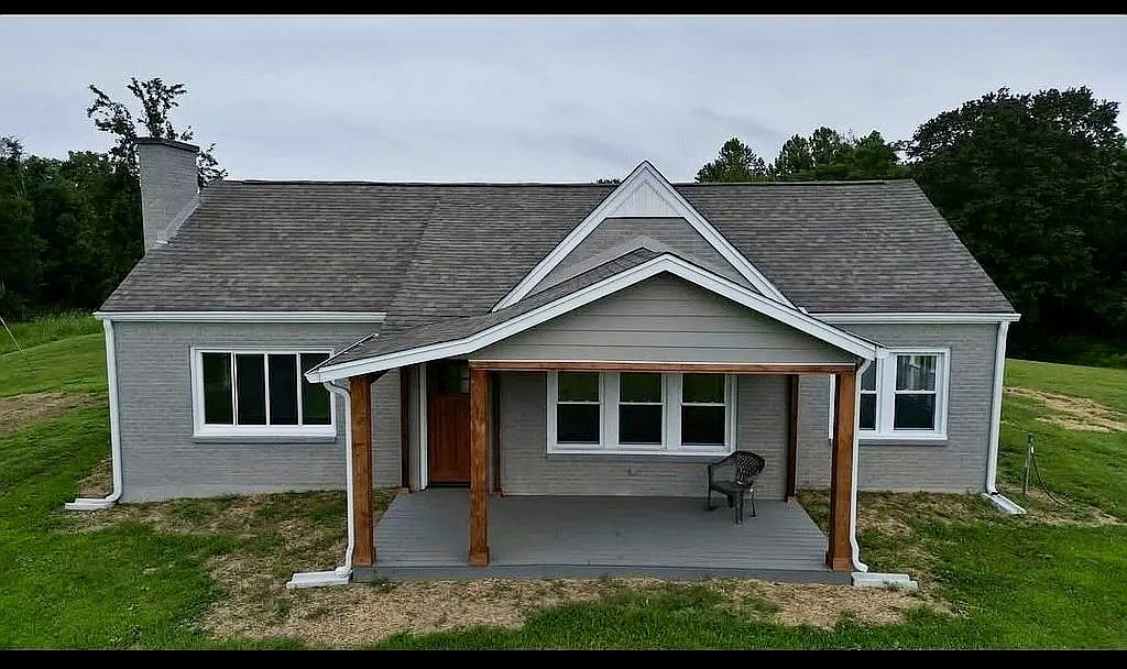 7140 Carthage Road Pleasant Shade, TN 37145 - Photo 1 of 36 a house view with a garden space