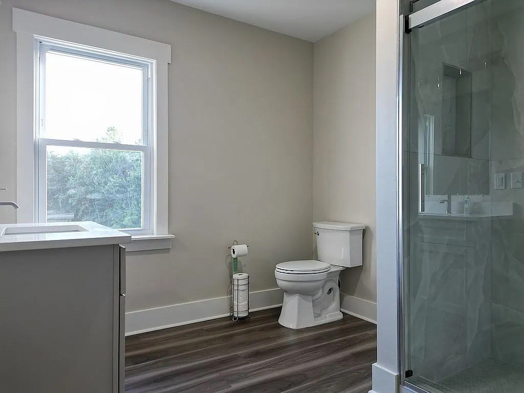 7140 Carthage Road Pleasant Shade, TN 37145 - Photo 20 of 36 a bathroom with a sink and a toilet