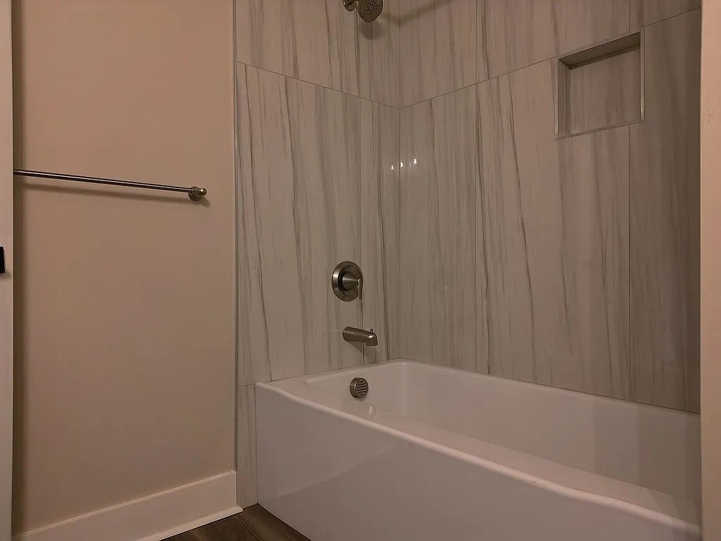 7140 Carthage Road Pleasant Shade, TN 37145 - Photo 30 of 36 a bathroom with a bathtub