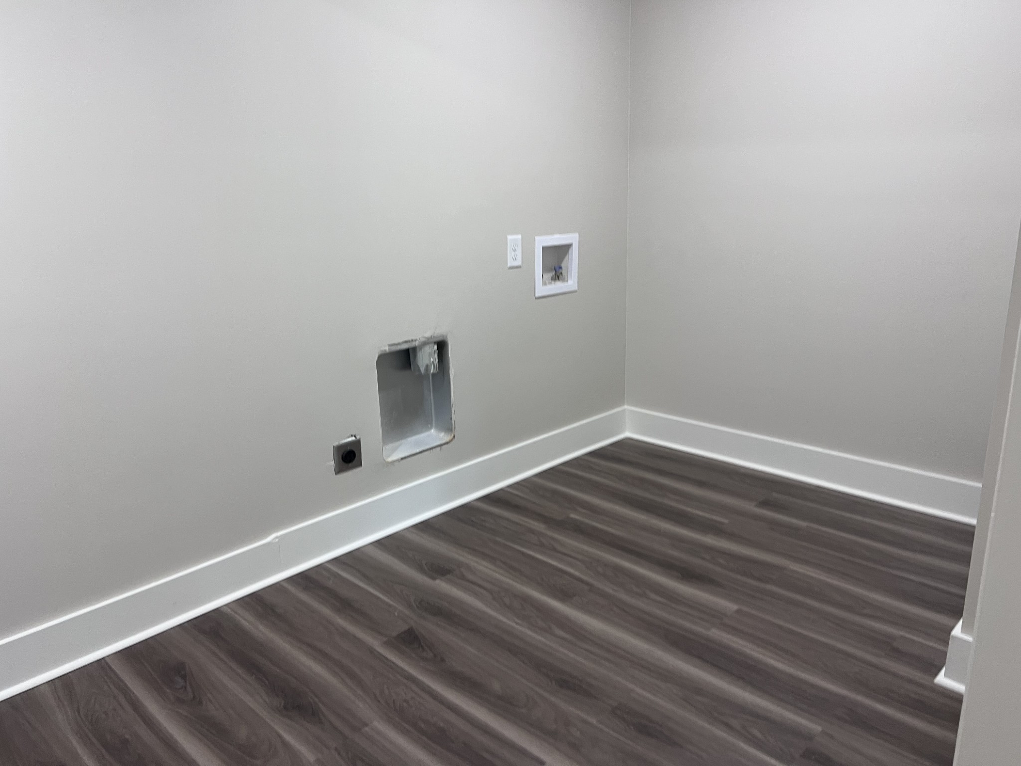 7140 Carthage Road Pleasant Shade, TN 37145 - Photo 31 of 36 a room with wooden floor and white walls
