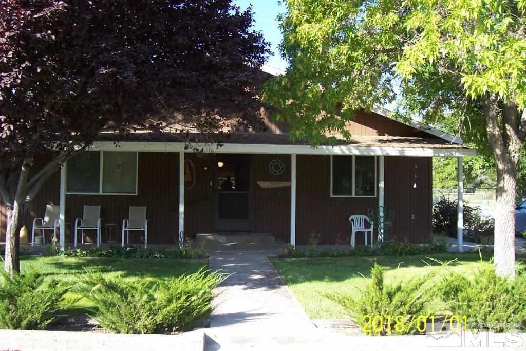 3700 Alcorn Road Fallon, NV 89406 - Photo 2 of 25 front view of a house with a yard