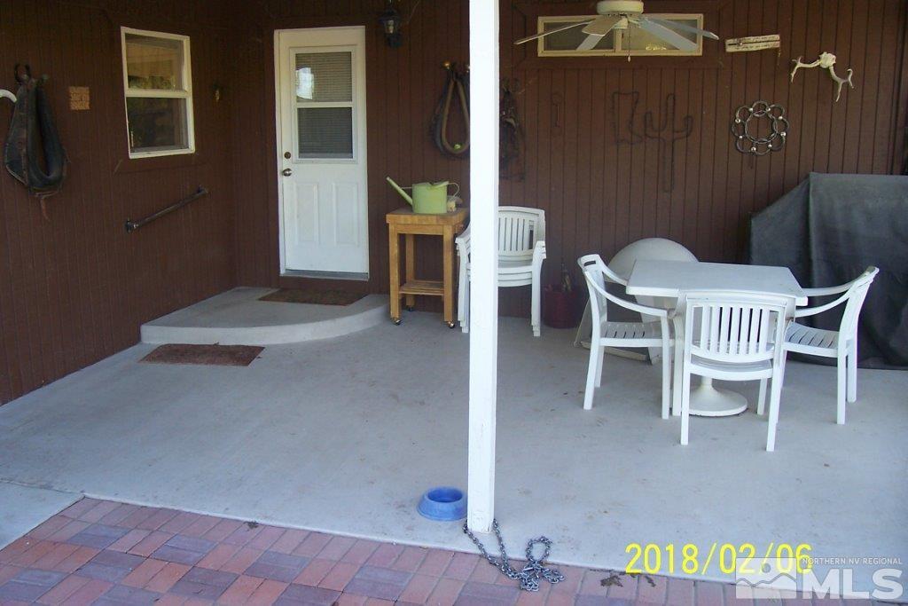 3700 Alcorn Road Fallon, NV 89406 - Photo 23 of 25 a view of a patio with table and chairs