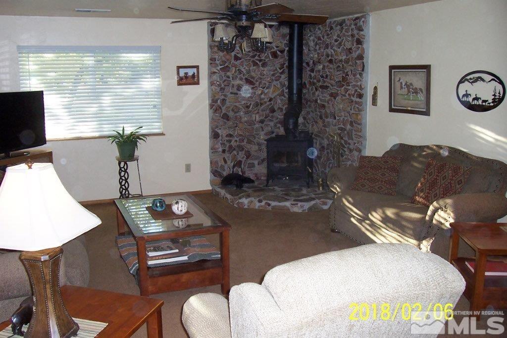 3700 Alcorn Road Fallon, NV 89406 - Photo 4 of 25 a living room with furniture and a flat screen tv