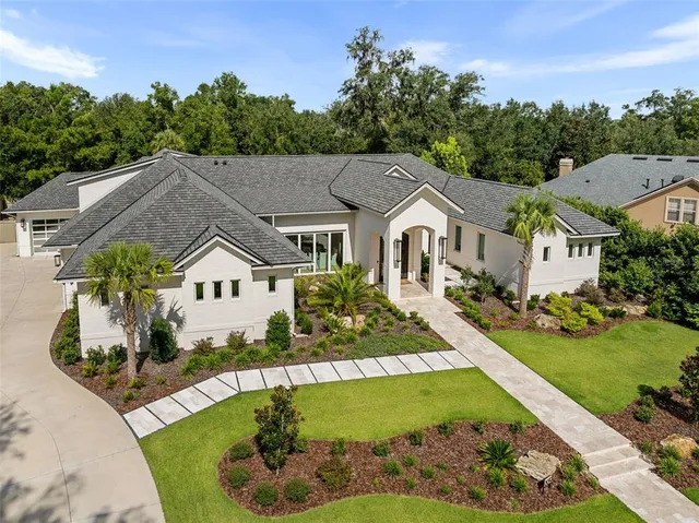 a view of house with garden space and street view