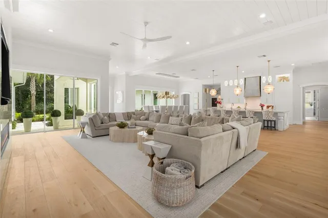 a spacious bathroom with a double vanity sink a mirror a bathtub and