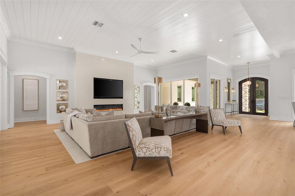 8679 Southwest 28 Lane Gainesville, FL 32608 - Photo 15 of 64 a living room with furniture and a flat screen tv