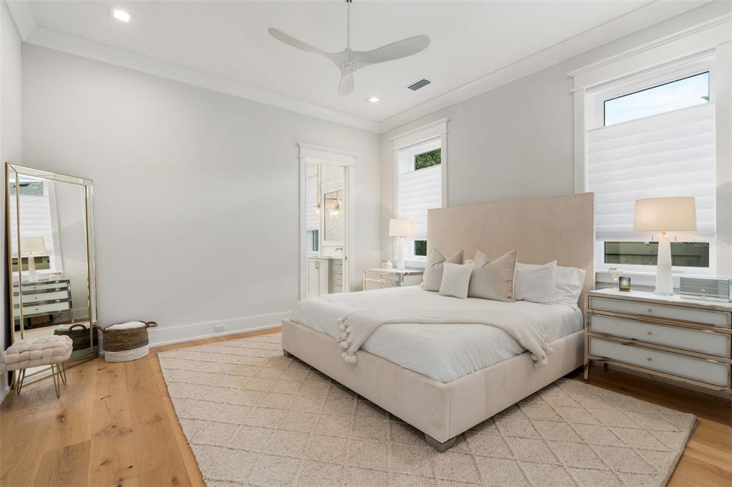 8679 Southwest 28 Lane Gainesville, FL 32608 - Photo 32 of 64 a living room with a bed furniture and next to a window