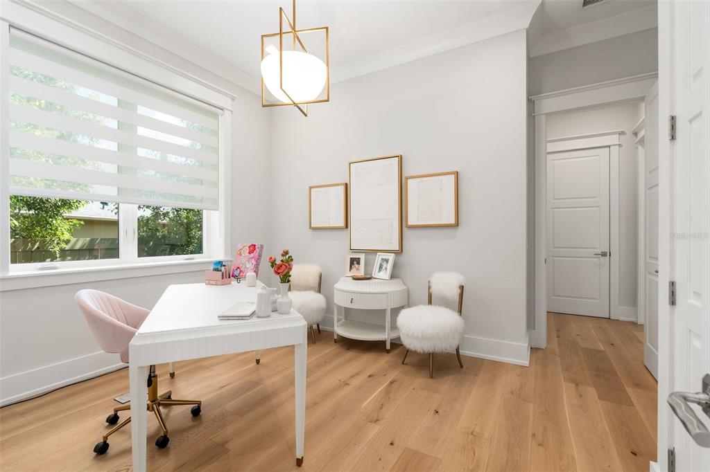 8679 Southwest 28 Lane Gainesville, FL 32608 - Photo 42 of 64 a living room with furniture and a window