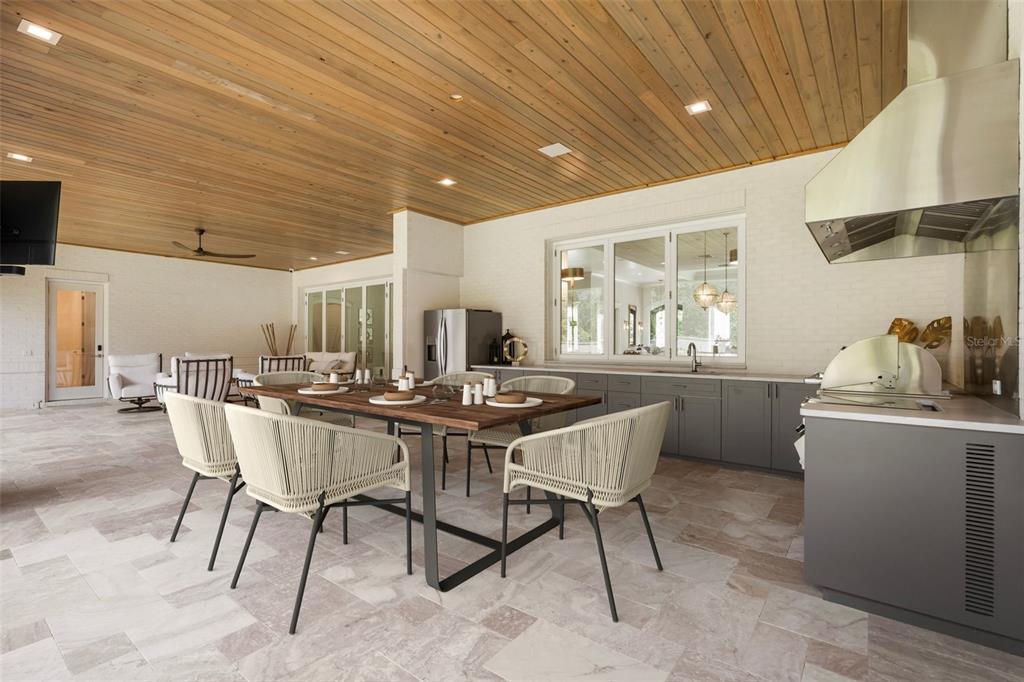 8679 Southwest 28 Lane Gainesville, FL 32608 - Photo 49 of 64 a view of a dining room with furniture window and wooden floor