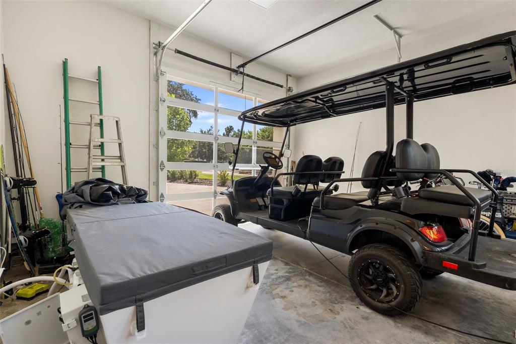 8679 Southwest 28 Lane Gainesville, FL 32608 - Photo 52 of 64 a car is parked in a garage