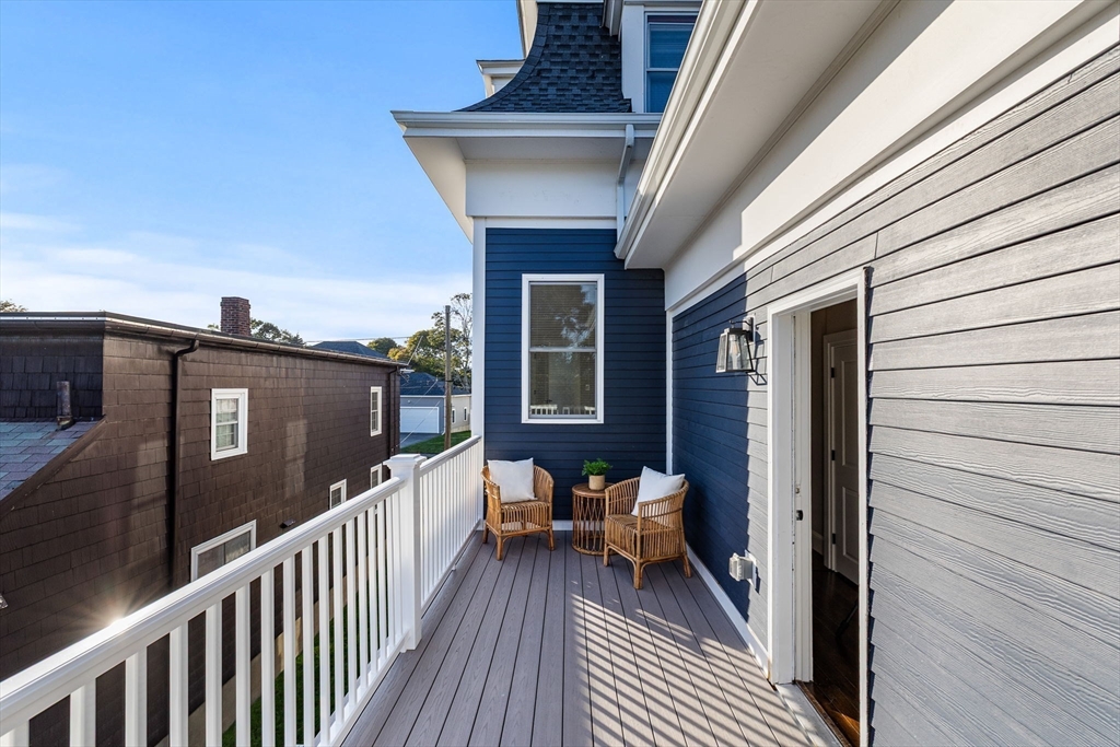 62 Chestnut Street, Unit 4 Saugus, MA 01906 - Photo 6 of 16 a view of a balcony with furniture
