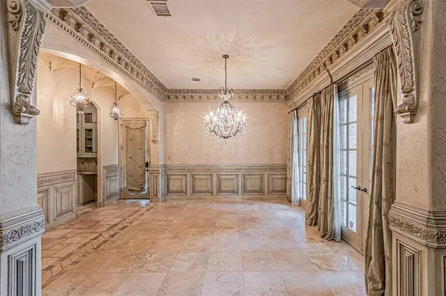 a view of a livingroom with furniture window and wooden floor