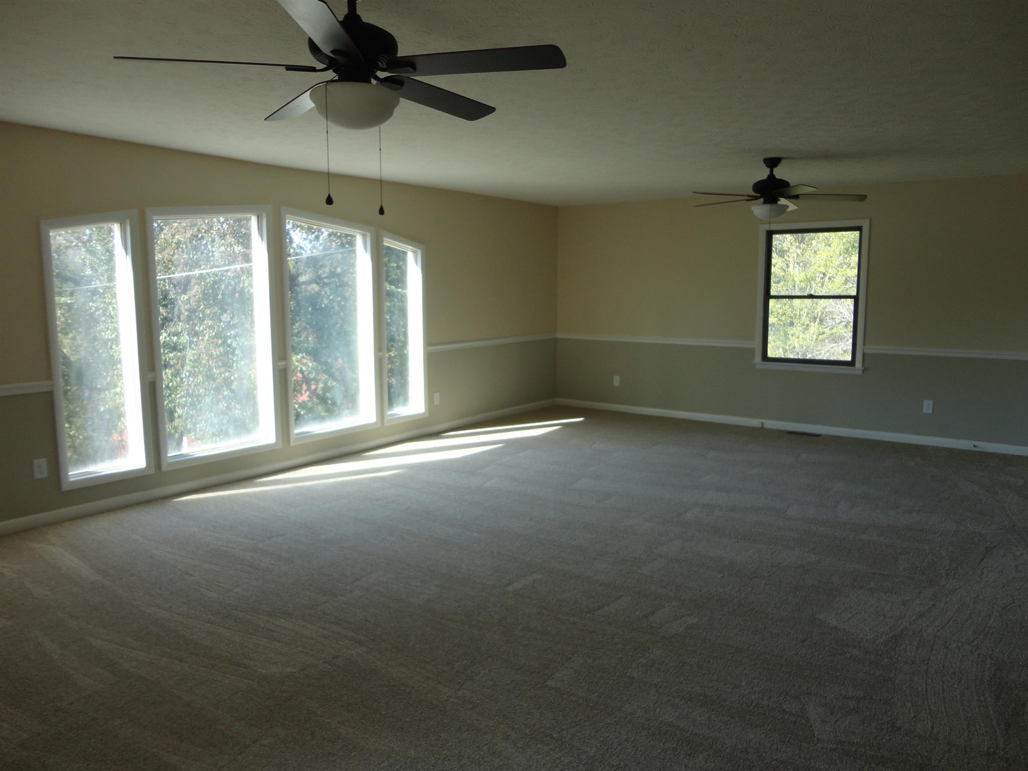 1665 Johnson Chapel Road Sparta, TN 38583 - Photo 10 of 26 Master bedroom is 20x26 with loads of natural light, 2 closets, carpet.