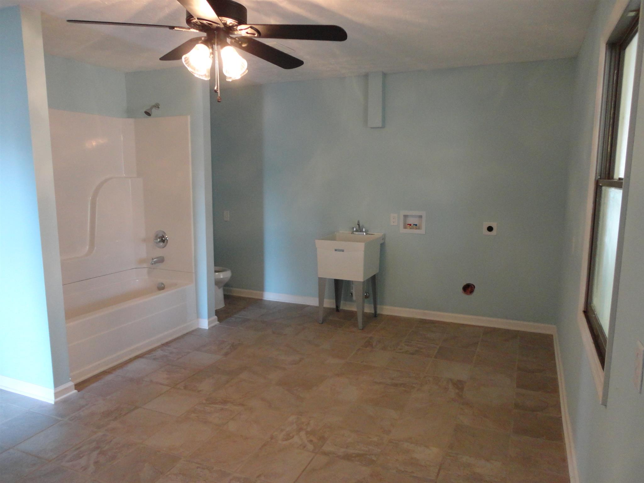1665 Johnson Chapel Road Sparta, TN 38583 - Photo 15 of 26 Bathroom with laundry hook ups is 16x13 with plenty of room for storage.