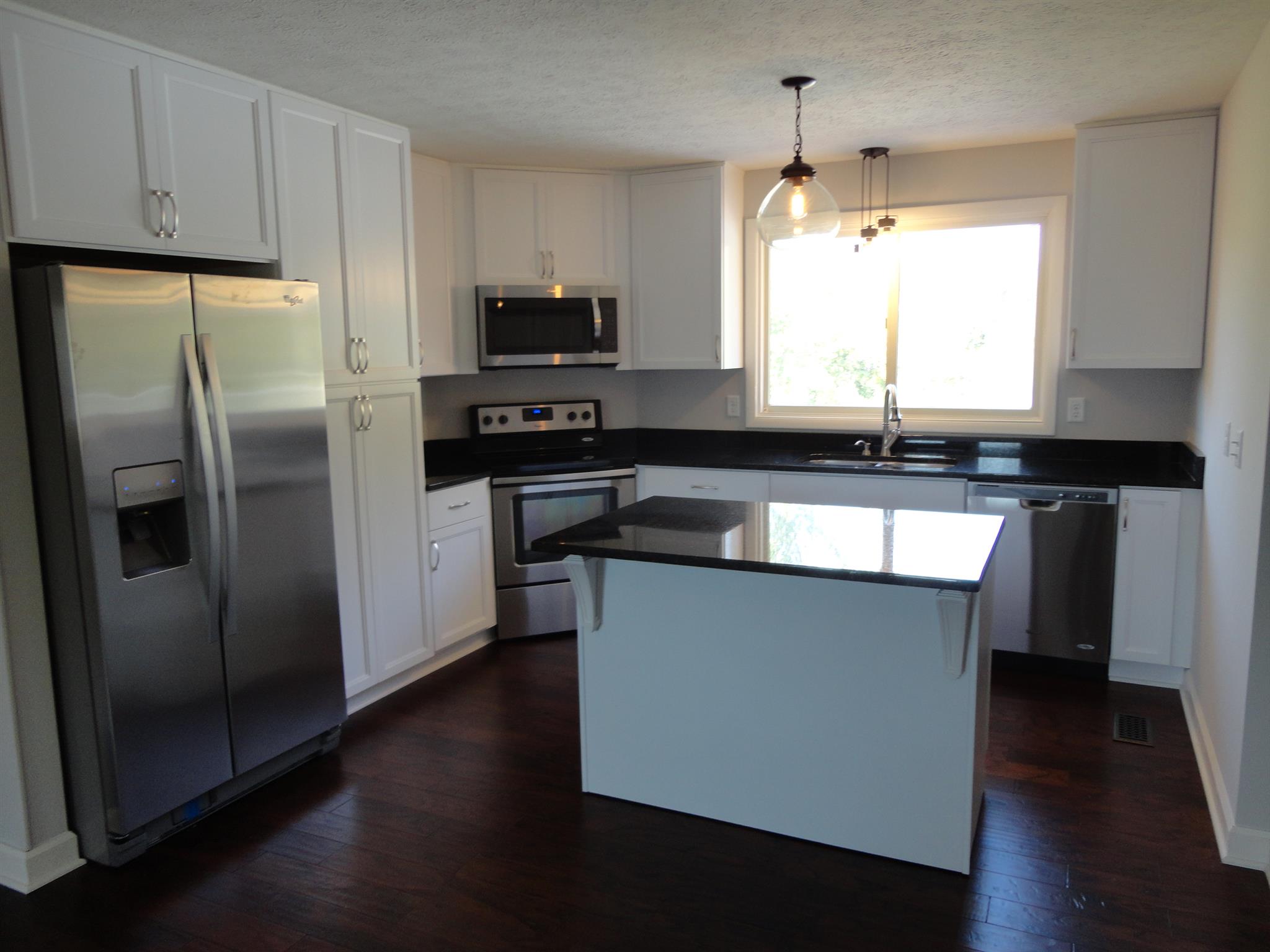 1665 Johnson Chapel Road Sparta, TN 38583 - Photo 6 of 26 All new kitchen with Whirlpool appliances, movable island. Overlooks pool and back yard.