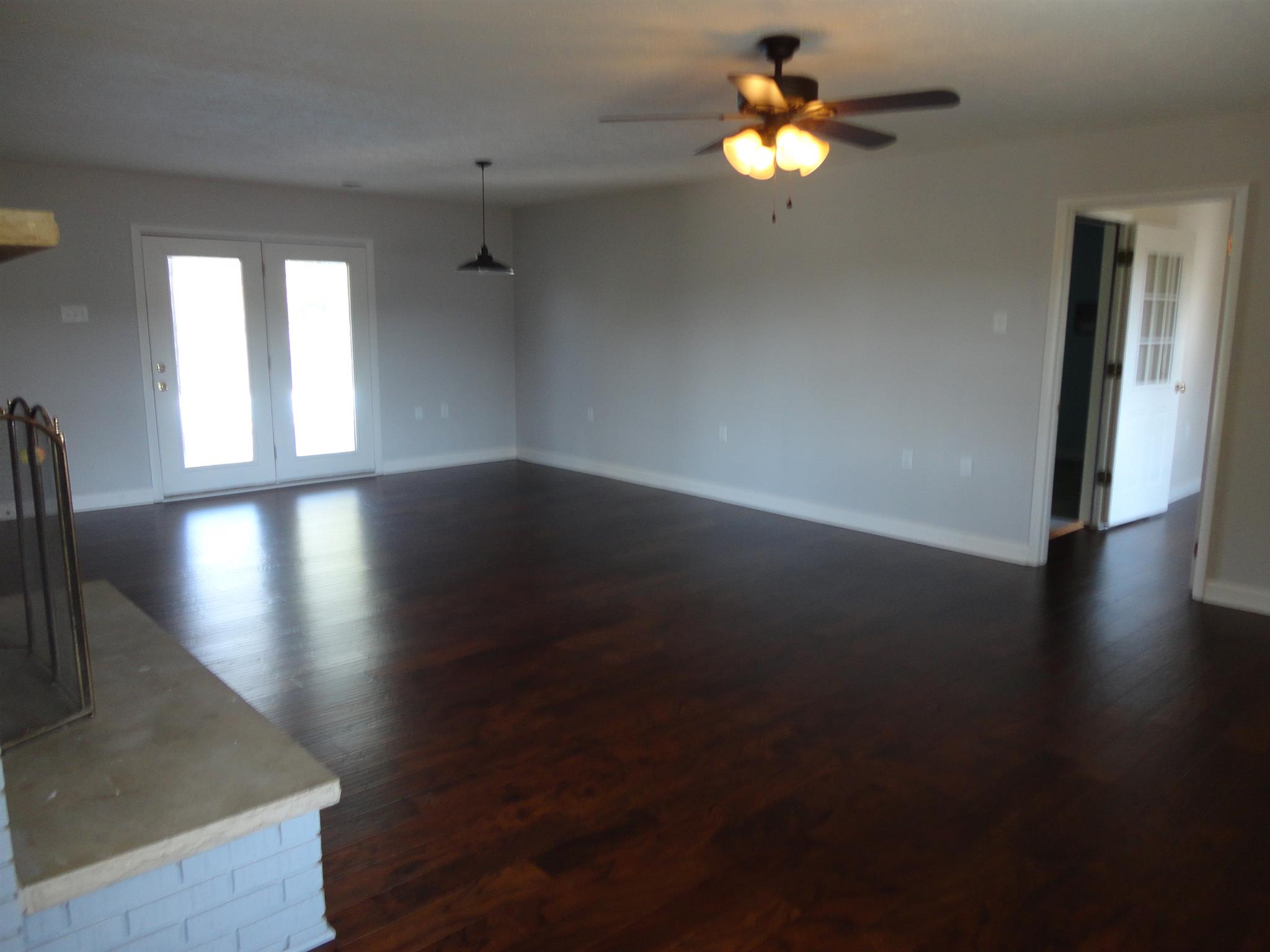 1665 Johnson Chapel Road Sparta, TN 38583 - Photo 7 of 26 Open living space has door to patio and pool.