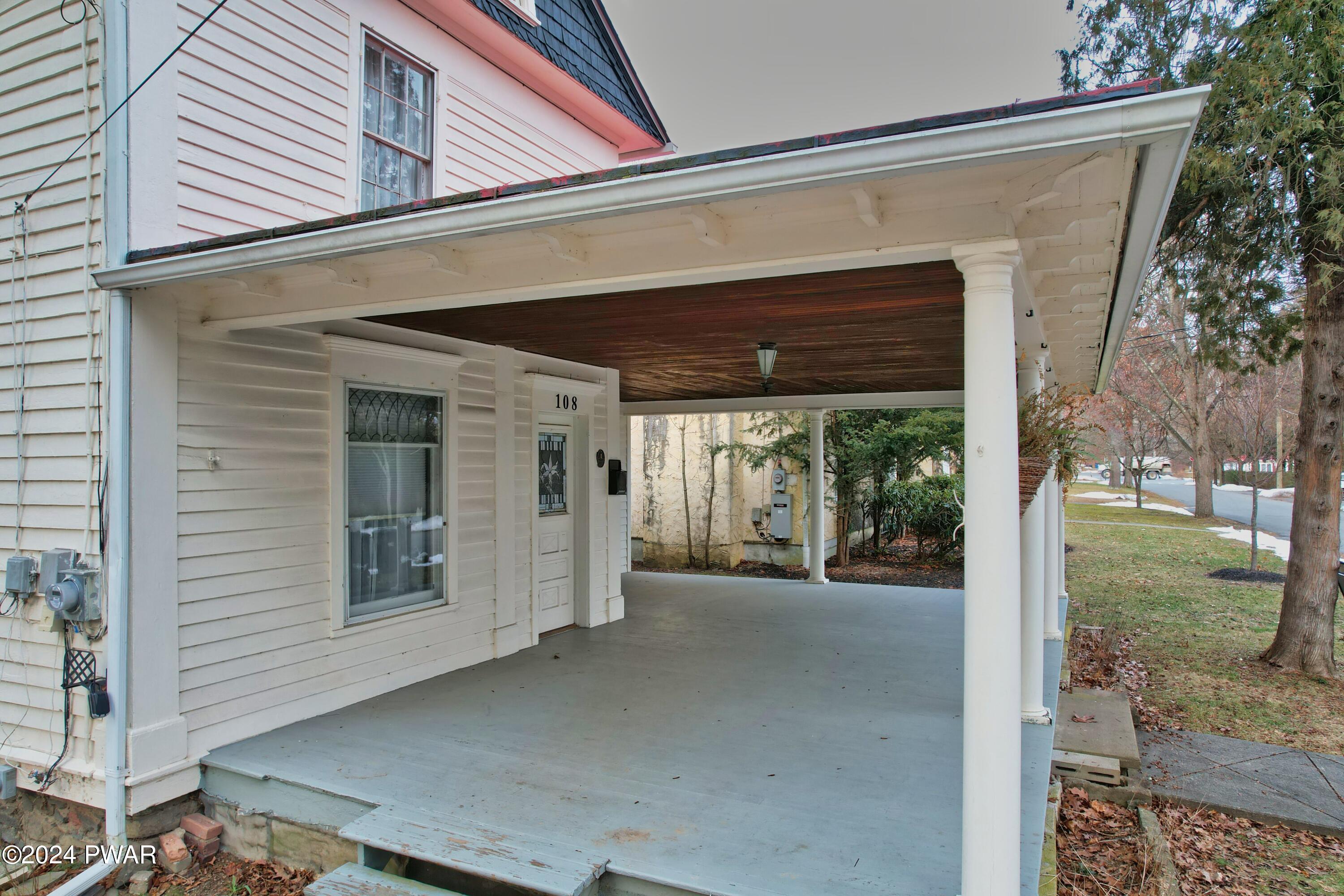 108 9th Street Milford, PA 18337 - Photo 3 of 38 a view of a house with a balcony