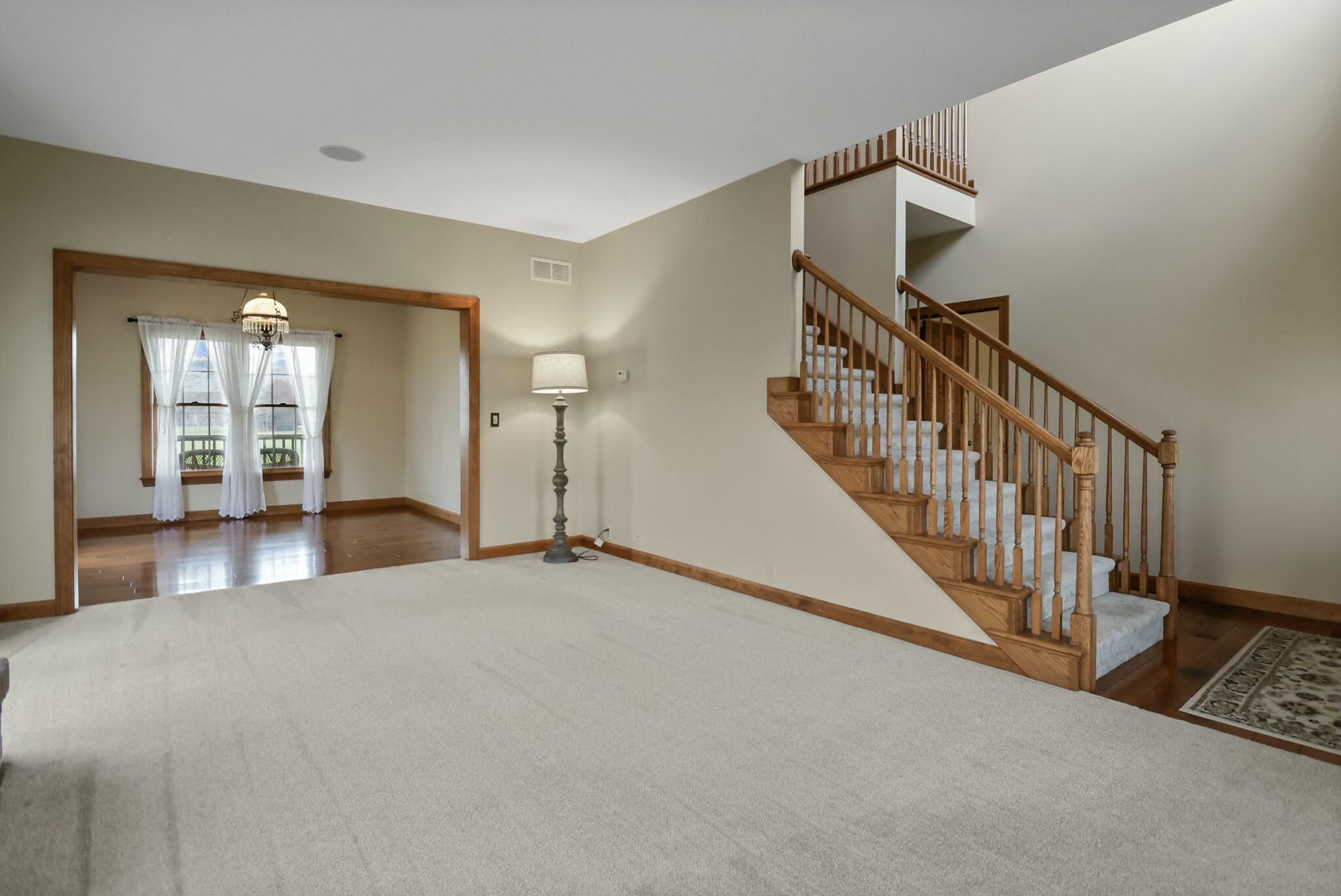 172 Lee Drive Kouts, IN 46347 - Photo 11 of 63 a view of an entryway with wooden floor