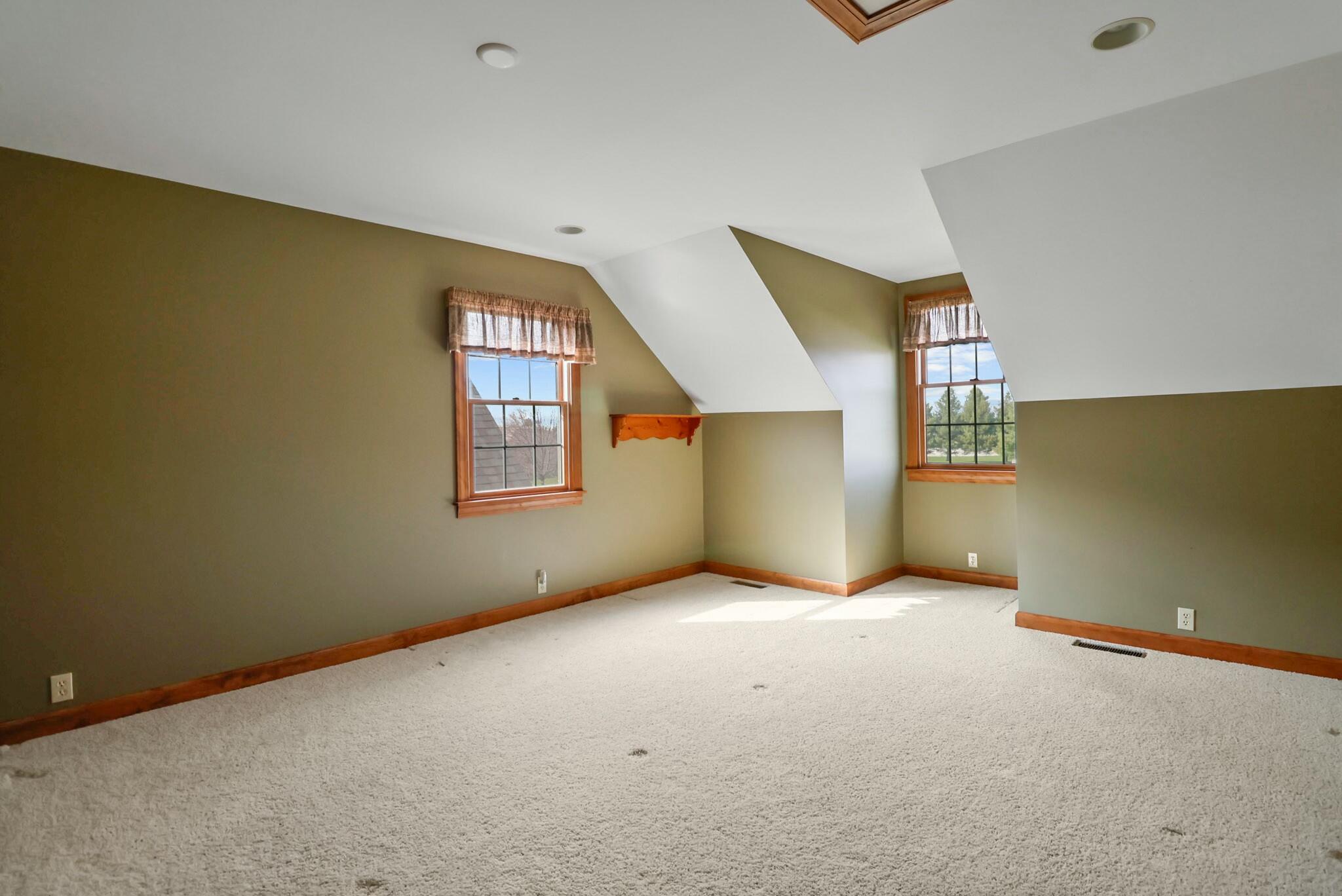 172 Lee Drive Kouts, IN 46347 - Photo 30 of 63 an empty room with windows