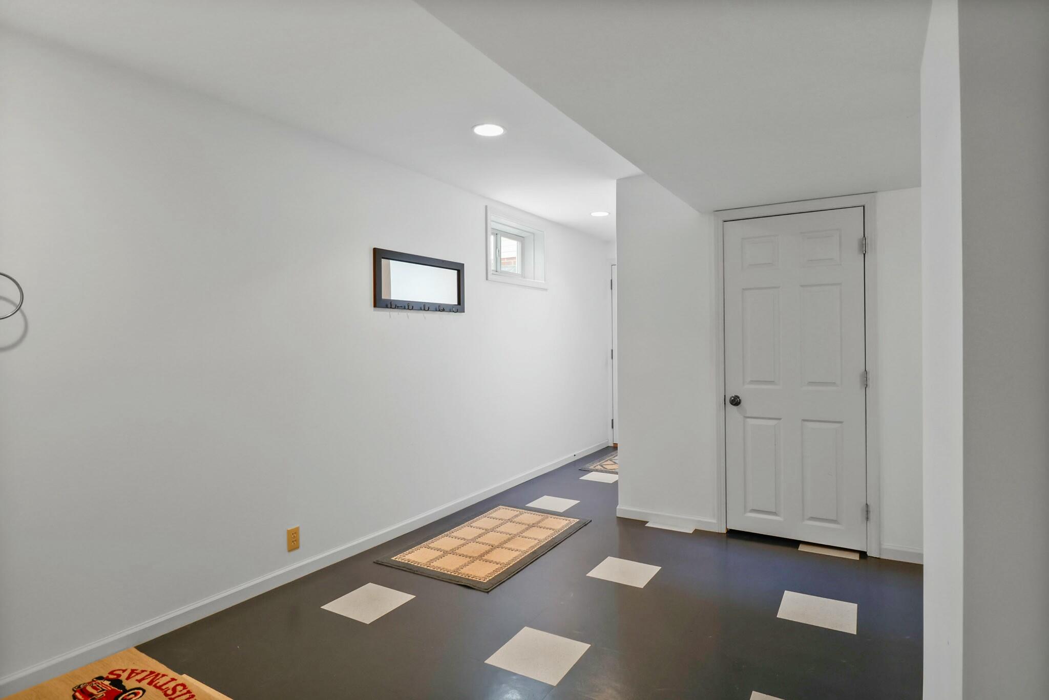 172 Lee Drive Kouts, IN 46347 - Photo 38 of 63 a view of room with window and couch