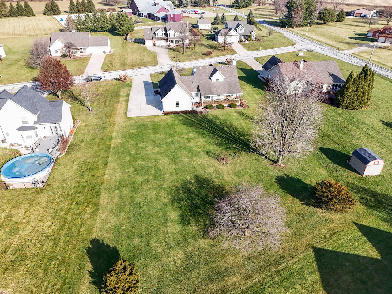 172 Lee Drive Kouts, IN 46347 - Photo 50 of 63 a view of swimming pool with a yard and plants