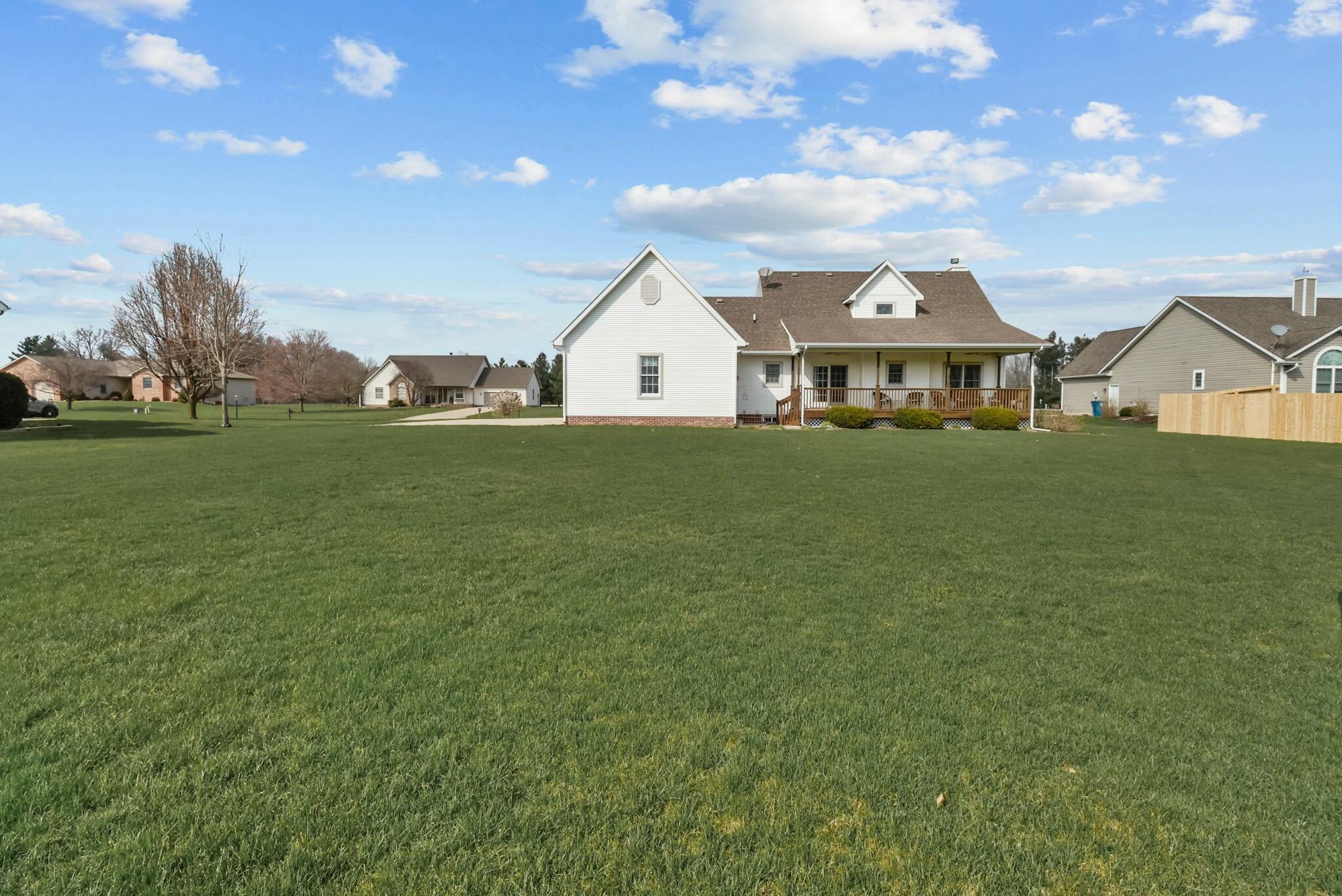 172 Lee Drive Kouts, IN 46347 - Photo 59 of 63 a view of house with outdoor space and garden