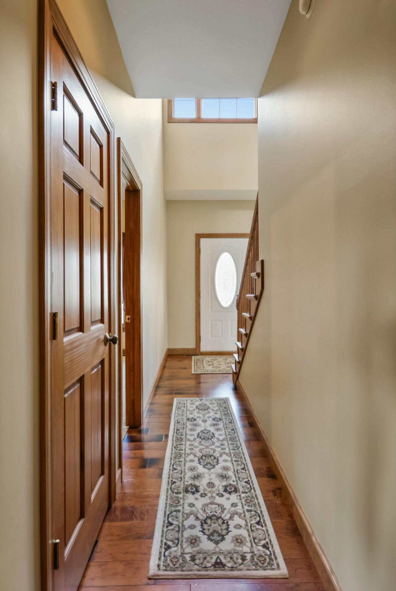 172 Lee Drive Kouts, IN 46347 - Photo 7 of 63 a view of entryway with wooden floor