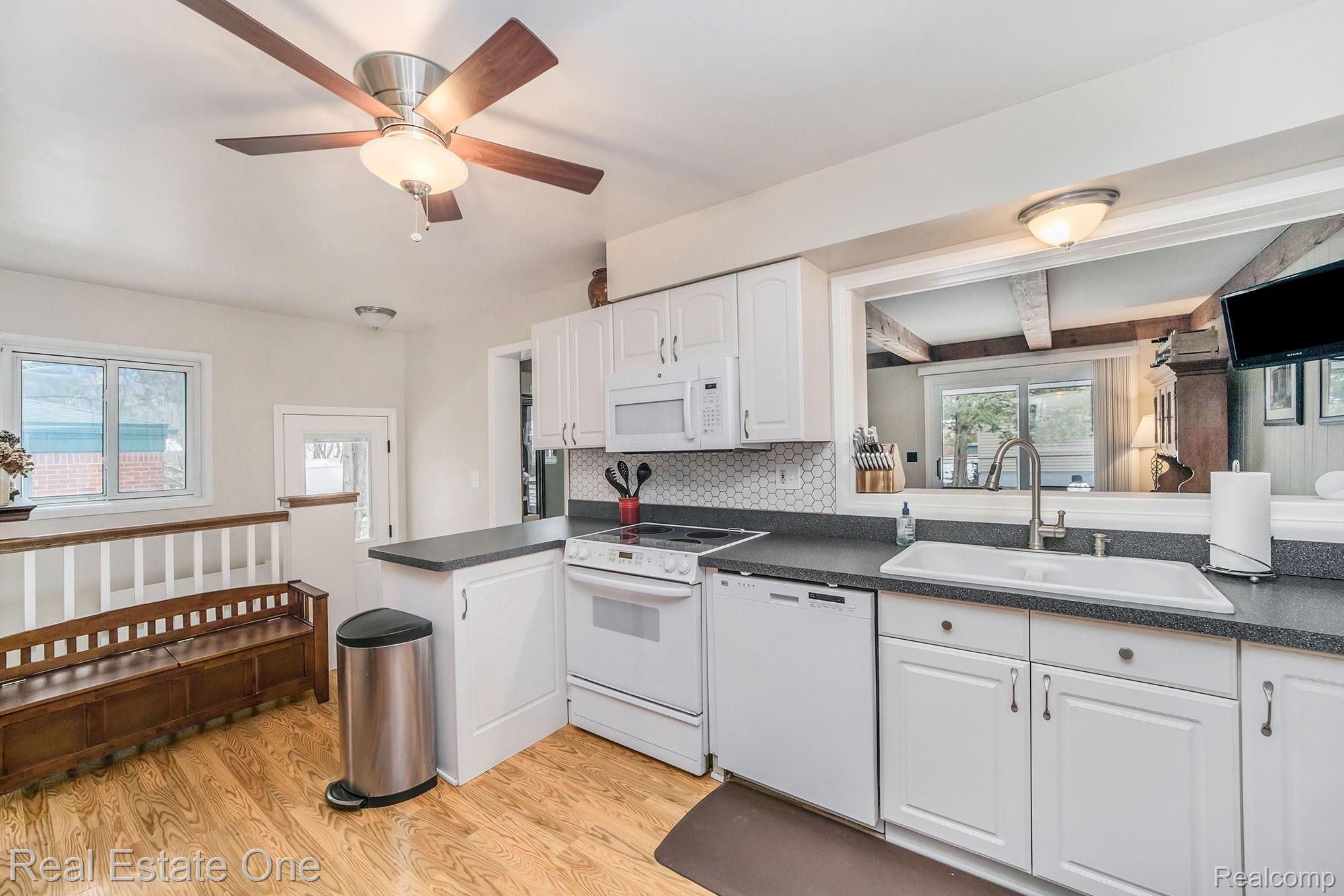 1276 Catalpa Drive Rochester, MI 48307 - Photo 12 of 28 Kitchen View to Basement and Living Room.jpg