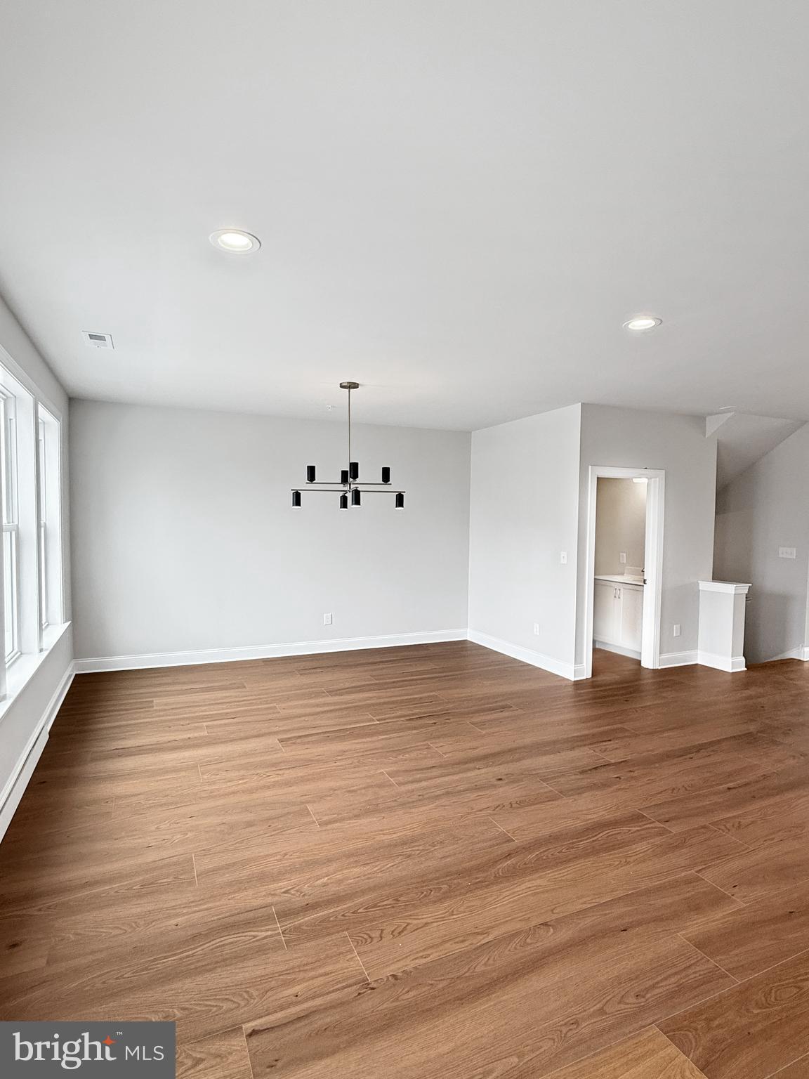 3 Schadle Road Perkasie, PA 18944 - Photo 15 of 40 a view of an empty room with wooden floor and windows