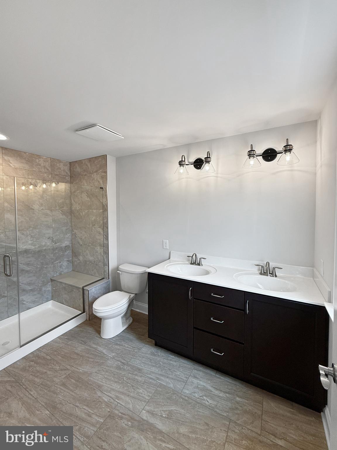 3 Schadle Road Perkasie, PA 18944 - Photo 24 of 40 a spacious bathroom with a bathtub sink mirror and toilet