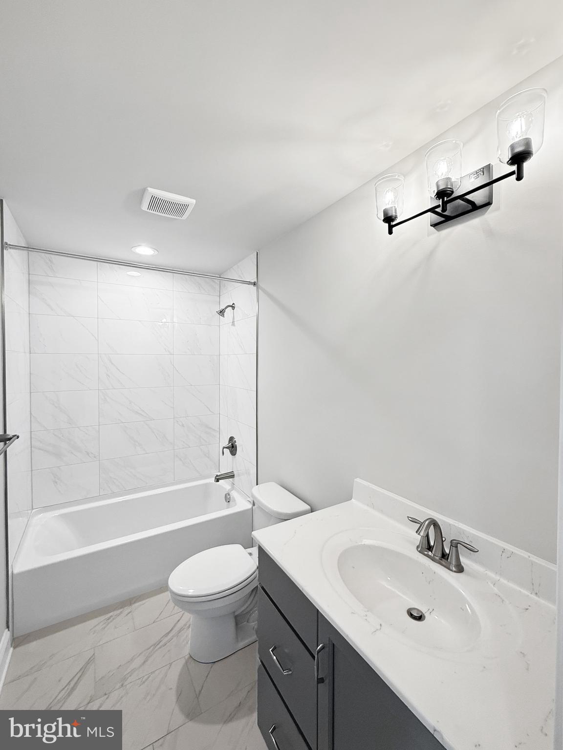 3 Schadle Road Perkasie, PA 18944 - Photo 25 of 40 a bathroom with a sink a toilet and a mirror