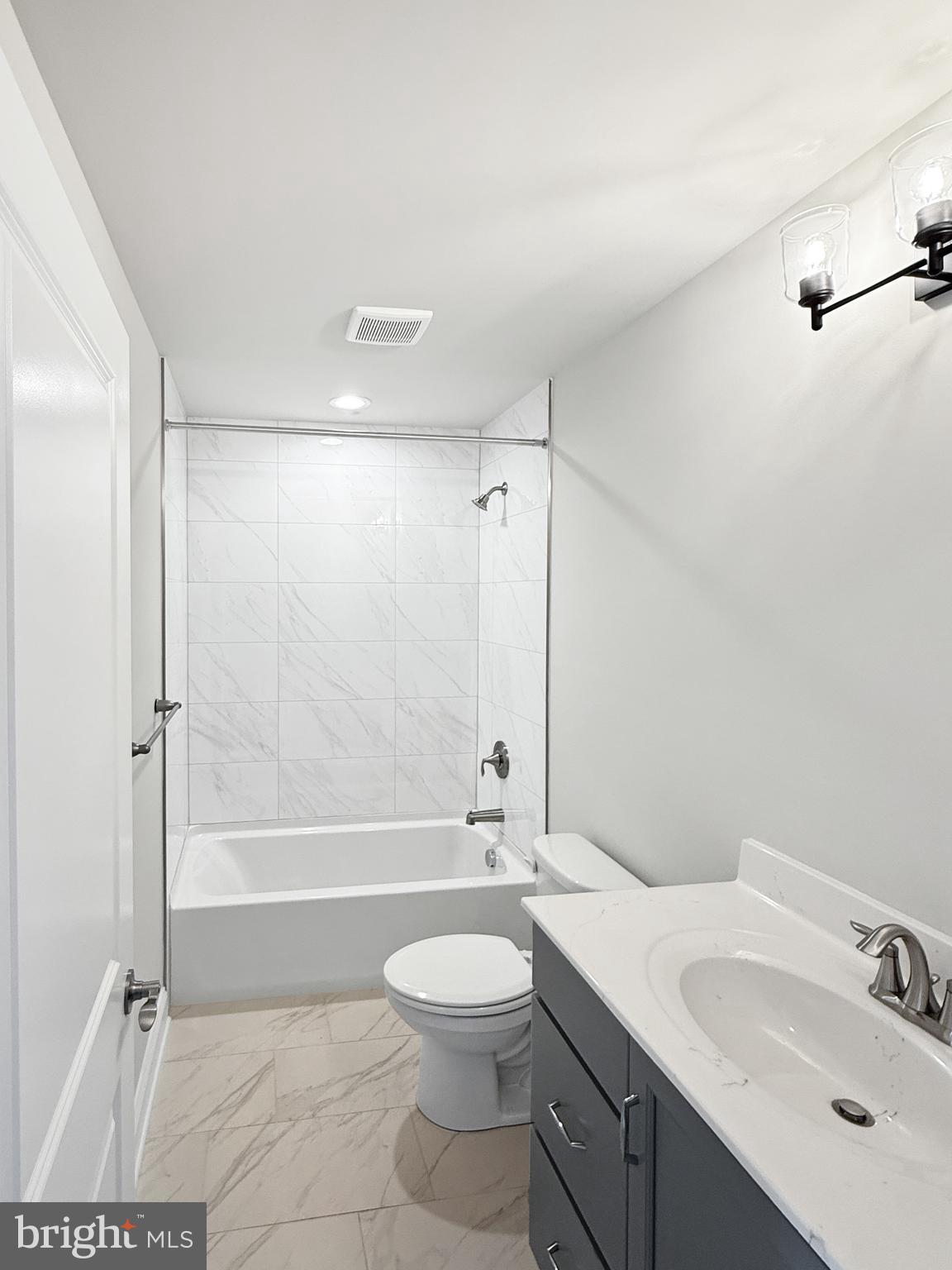 3 Schadle Road Perkasie, PA 18944 - Photo 26 of 40 a bathroom with a double vanity sink toilet mirror and shower