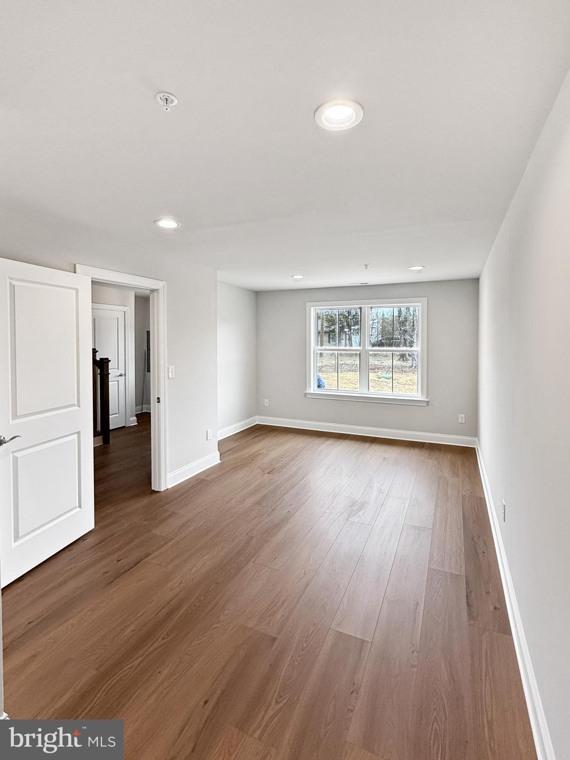 3 Schadle Road Perkasie, PA 18944 - Photo 30 of 40 an empty room with wooden floor and windows