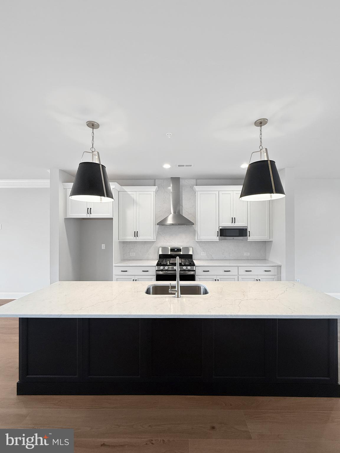 3 Schadle Road Perkasie, PA 18944 - Photo 5 of 40 a living room with a black white checkered floor